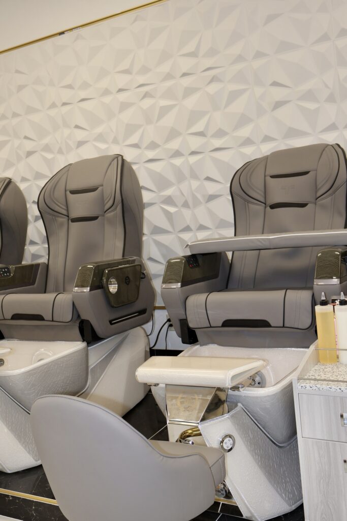 Nail Salon & Spa Interior Buildout with Mirrored Hexagon Accent Wall — photo 4