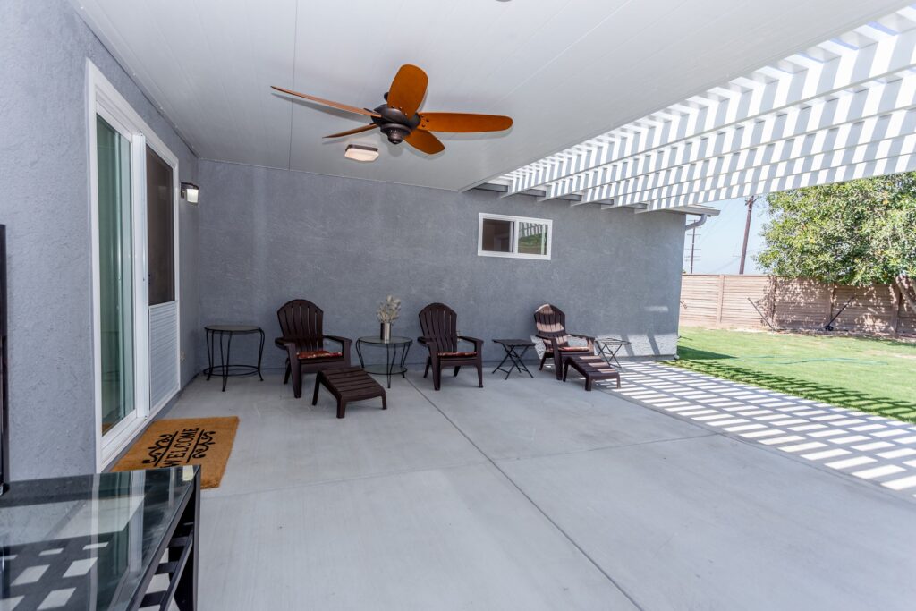 Solid-Roof Patio Cover with Open Lattice Pergola Extension — photo 1