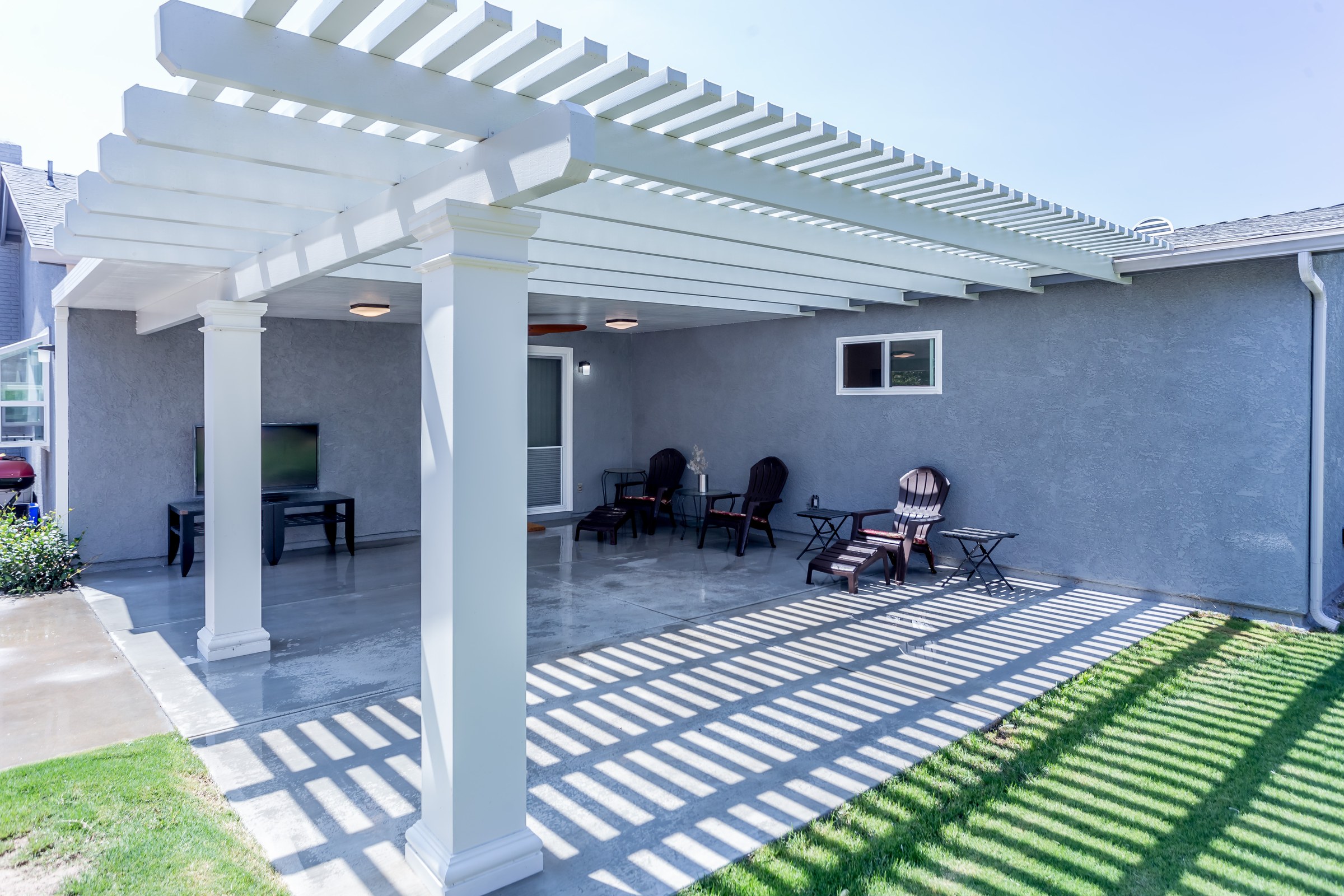 Solid-Roof Patio Cover with Open Lattice Pergola Extension