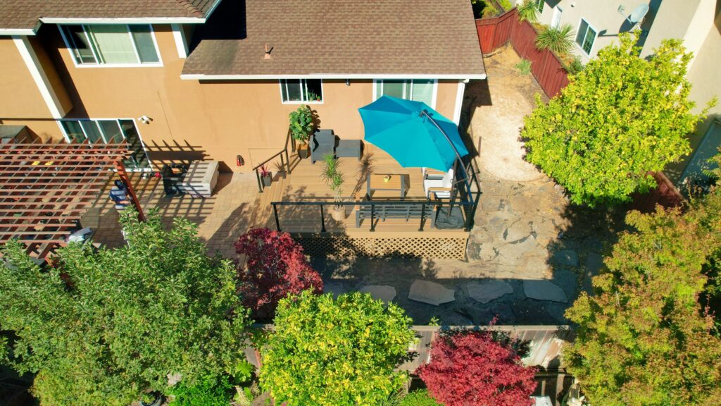Raised Composite Deck, Paver Patio & Landscape Design — photo 1