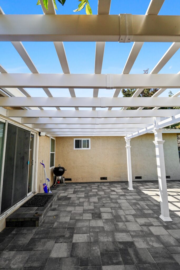 White Vinyl Pergola & Paver Patio Build — photo 3
