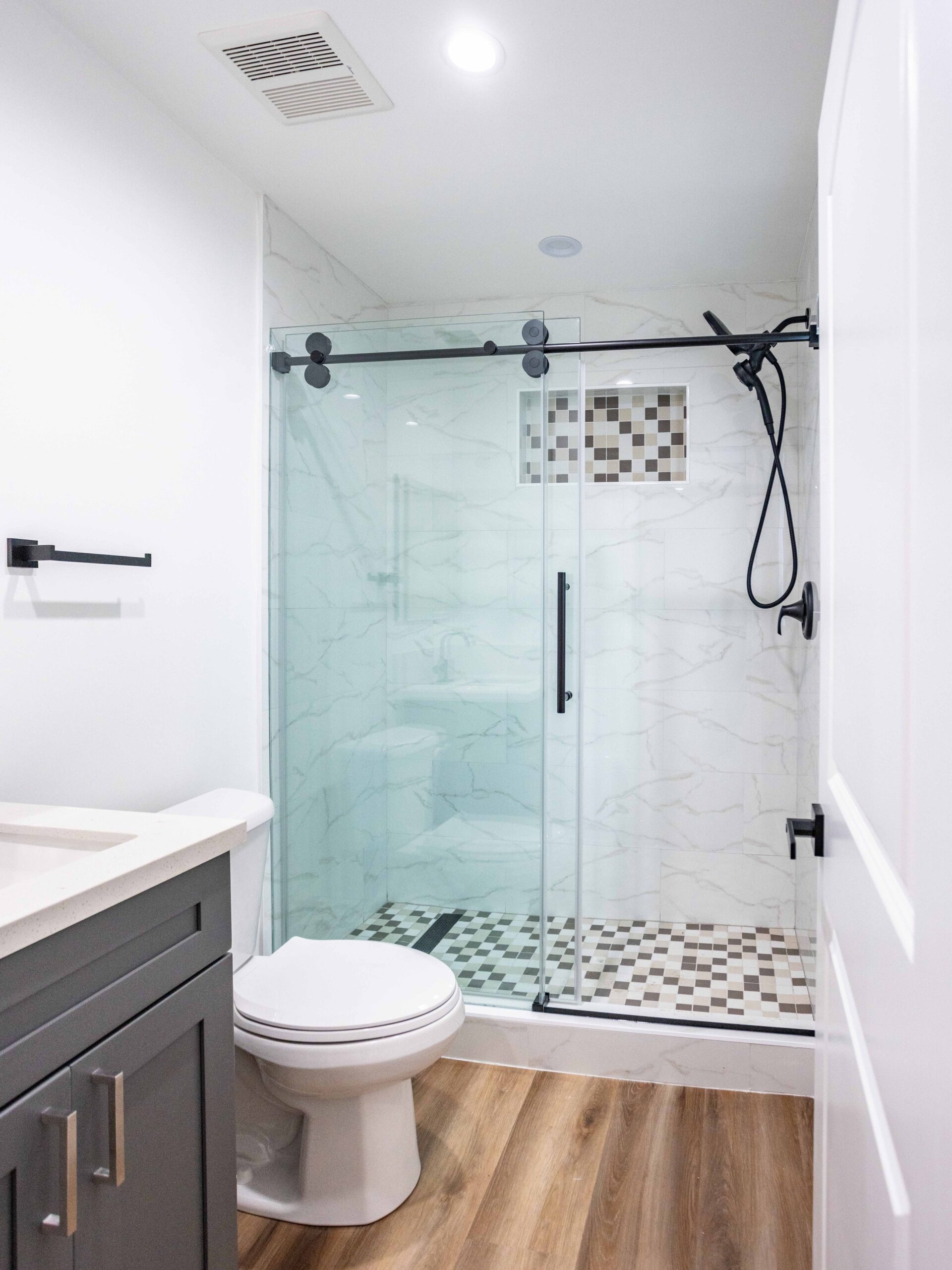 Vanity and mixer in the bathroom of the converted garage