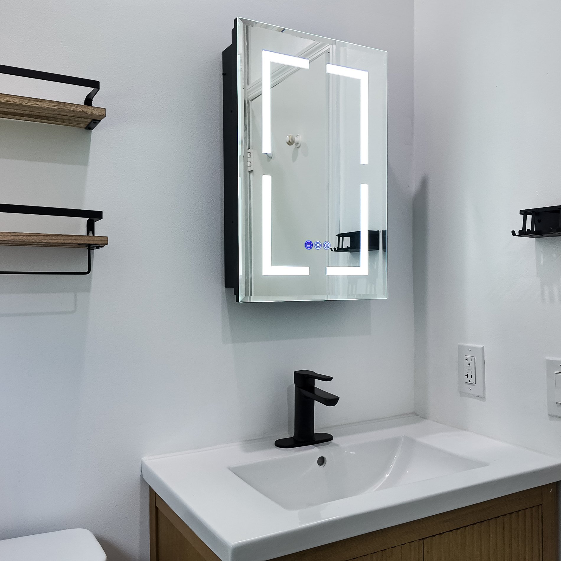 Matt black wall shelves and towel rail mounted on the bathroom wall